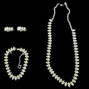 Elegant 3 piece rhinestone ensemble. Necklace, bracelet and clip earrings.